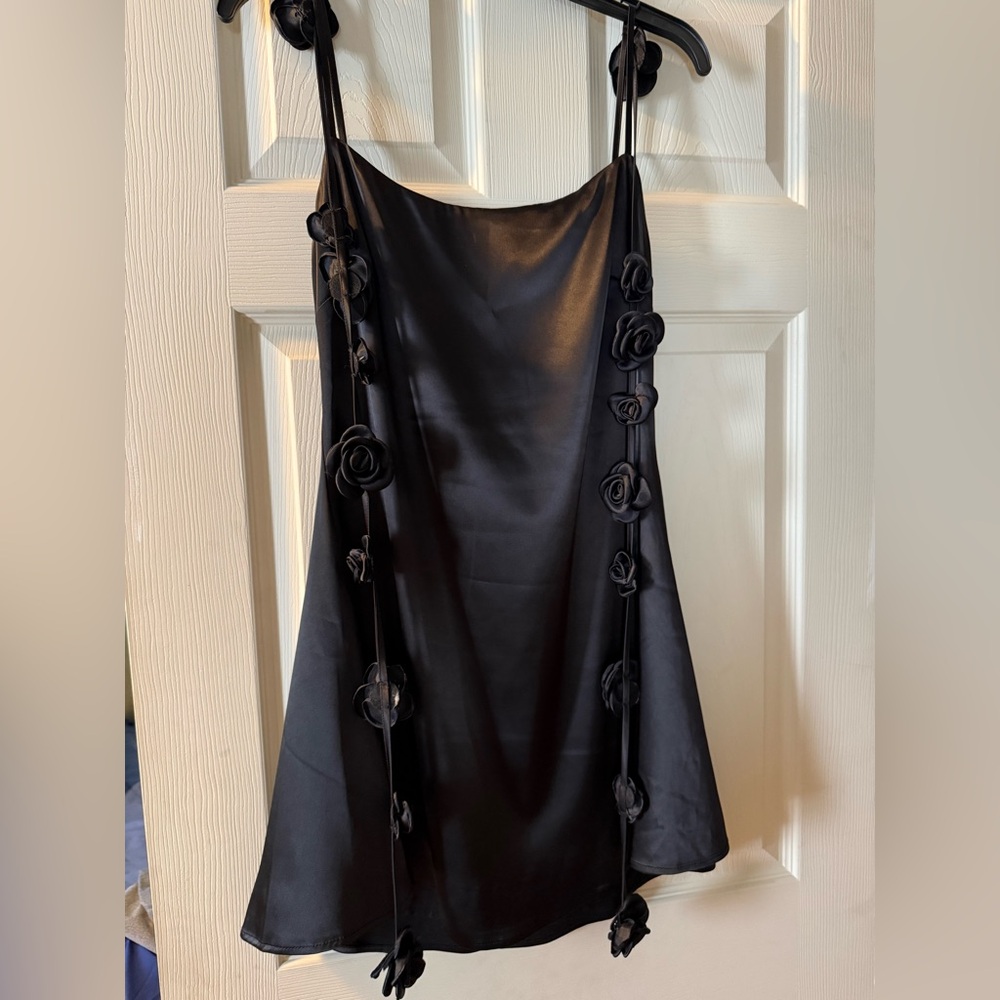 Elegant Black Dress with Floral Accents!